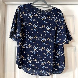 Short sleeved blouse with butterfly design